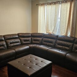 brown leather couch with storage ottoman