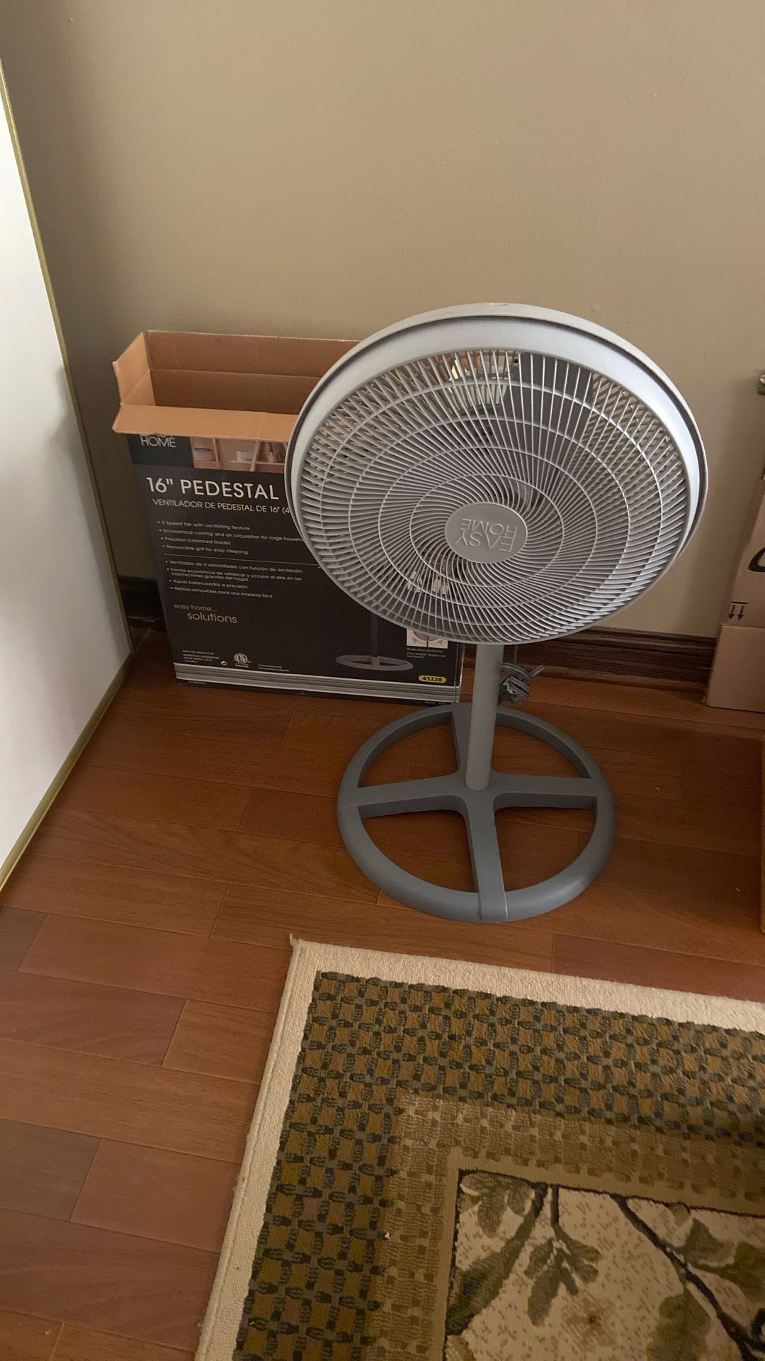 Grey pedestal Fan