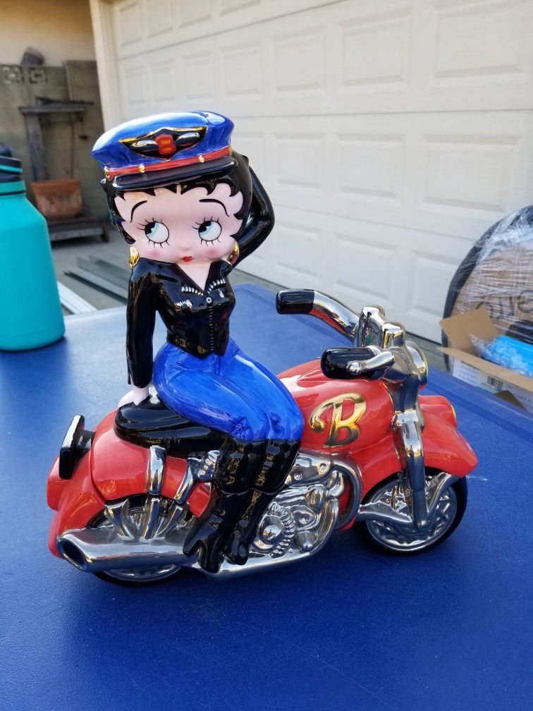 Betty Boop on motorcycle cookie jar