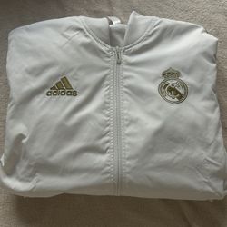 Adidas Men’s white and gold jacket