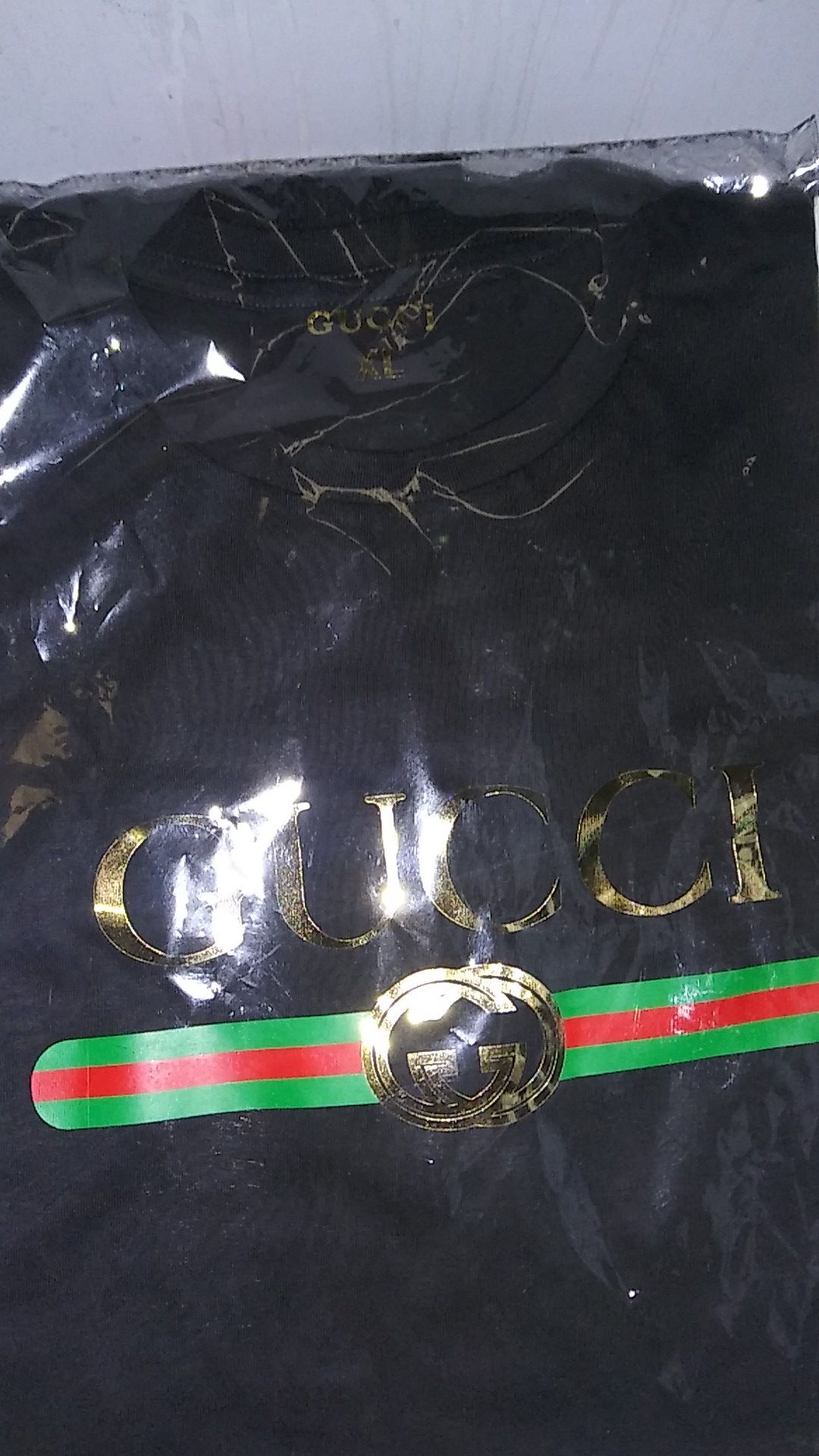 XL ..Black Gucci shirt brand new still in plastic