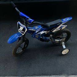 A Yamaha Pedal Toddler Motorbike. Blue,white And Black Price Is 100$ But Can Make Are Way To A Price You Feel Comfortable With.
