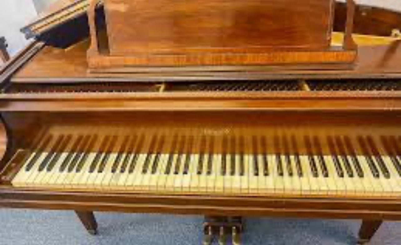 Vintage Howard cincinnati baby grand piano