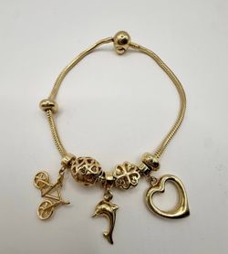 PULSO CON DIJES DE ORO