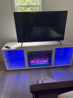 White TV Stand with Electric Fireplace and LED Shelves