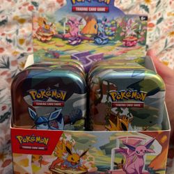 Pokemon Prismatic Evolution Tins 