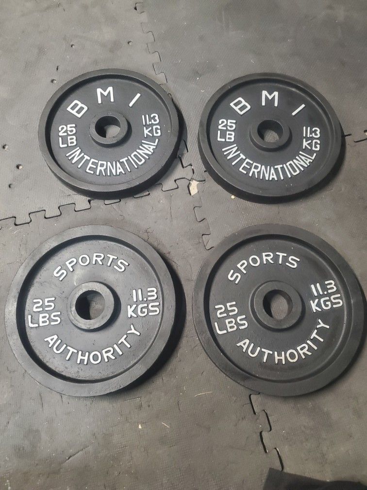 Olympic Weight Set 4x25lbs That's 100lbs All Together Selling All For $110 Or $60 Each Set..