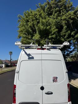 Drop-Down Ladder Rack, Extended, Mid/High-Roof, Heavy Duty.