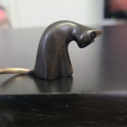 Grooming Cat Sculpture made by German artist Yenny Cocq