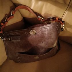 A Brown Pebbled Coach Purse...