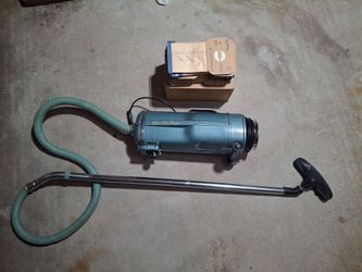 Electrolux model "E" Vaccum  cleaner with 26 filter bags