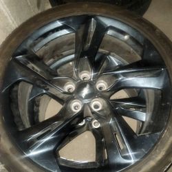Camaro Stock Rims With 2 Very Good Tires 