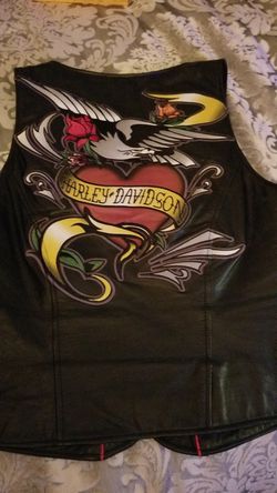 New Harley Davidson's leather vest large with beautiful design on the back.