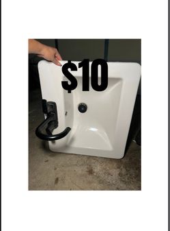 White drop in ceramic sink