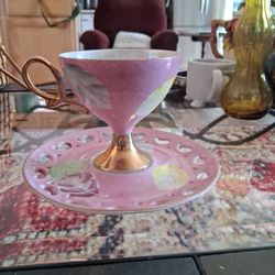 Vintage Nasco footed cup and saucer set originating from Japan.