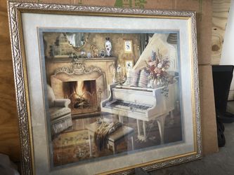 Home interiors gold frame grand piano/fireplace picture