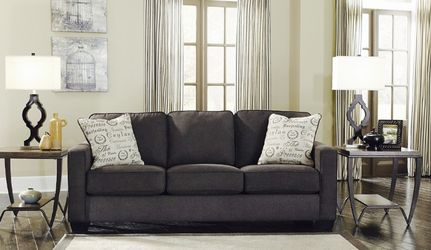 New beautiful couch with Pillows! More specials on bedroom suite, couch and loveseat now!