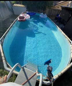 coleman pool (26f x 12f) in great condition with big sand pump/filter upgrade (like new)