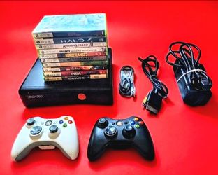 Microsoft Xbox 360 slim with 2 controllers 10 games HDMI cord power supply