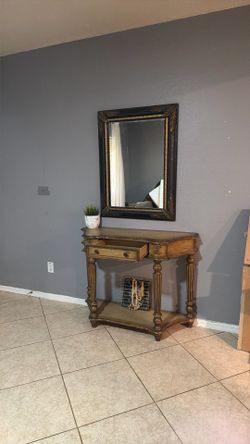 Entry table and mirror