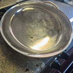 Large oval, stainless steel serving platter