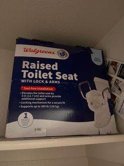 Raised toilet seat