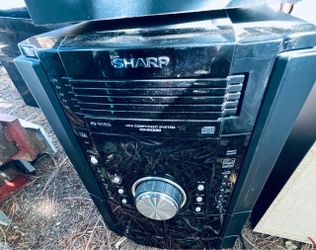 Sharp cd/tape player and 2-3 speakers.