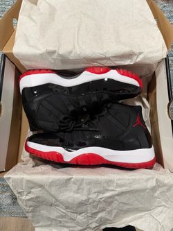 Air Jordan 11s Bred