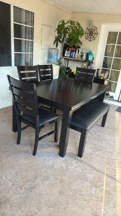 Balck Dining table and 4 Chairs one bench