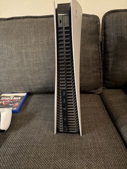 PS5, controller and games
