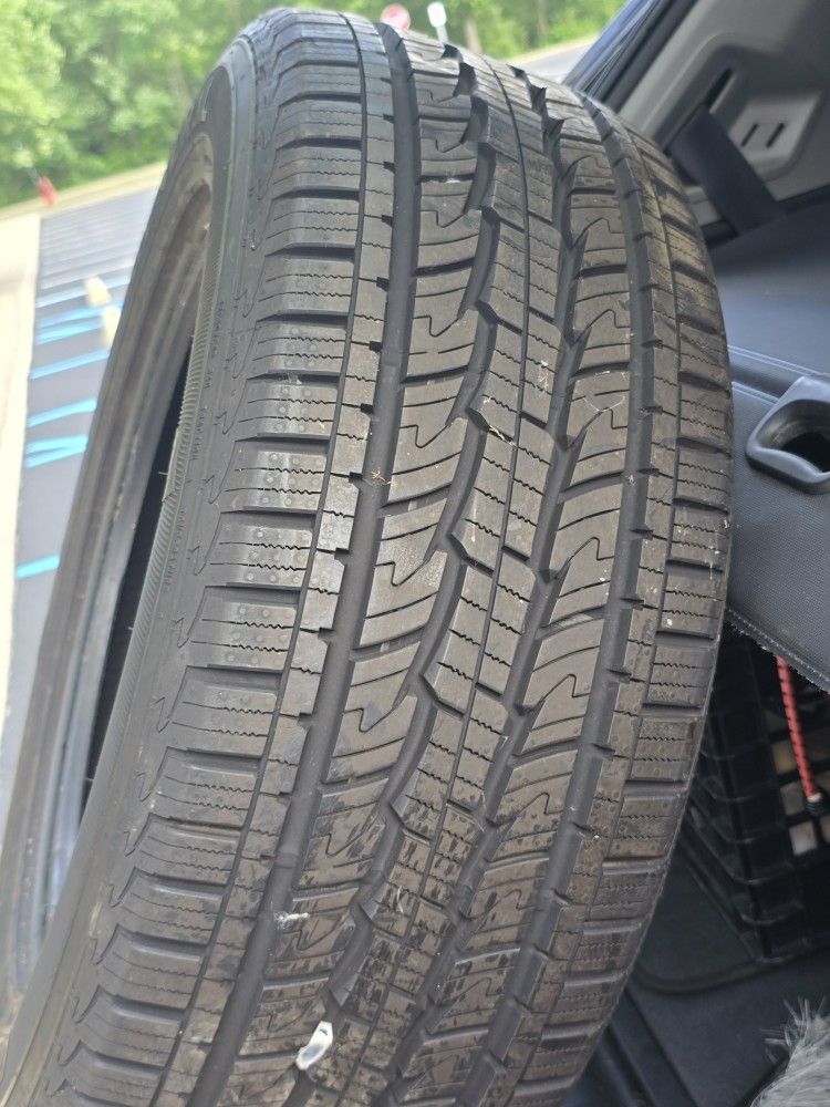 1 Used Tire with good threads. 
