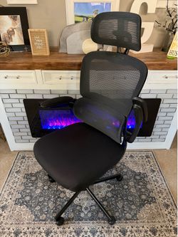 This Tralt chair is in perfect condition! Swivel, tilts, goes up and down, and roll smoothly. Lumbar and headrest are both adjustable! It also has fli