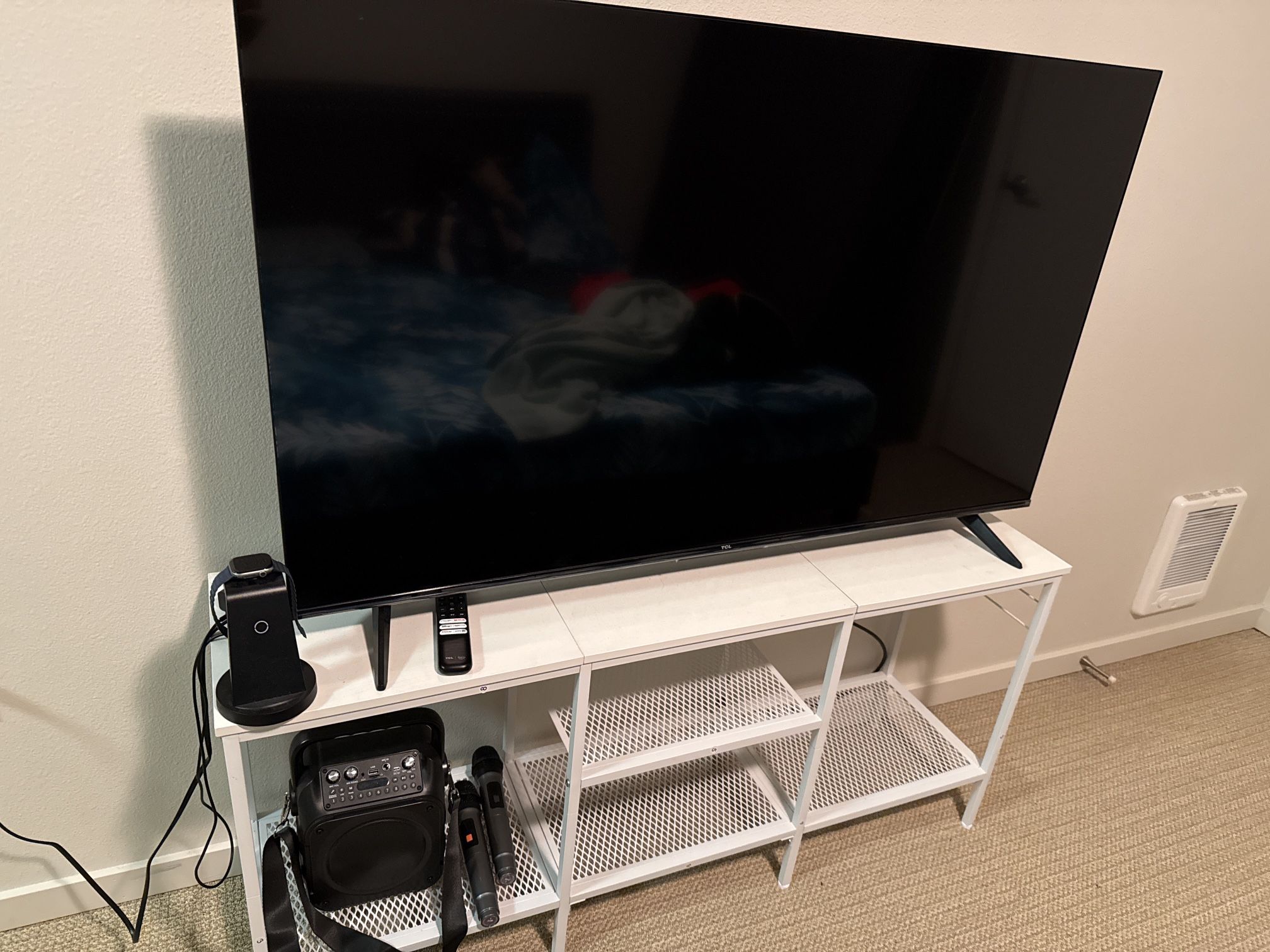 TCL 50 inch TV and TV stand