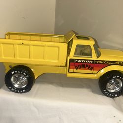 Vintage Nylint Dump Truck Dumper "You Call....We'll Haul" Metal  in good condition