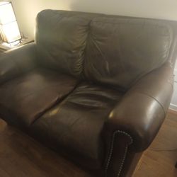 Ashley faux brown leather loveseat 