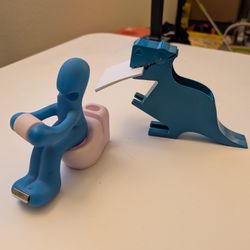 Tape, Paper Clip Toilet Man And Post It Dinosaur