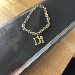 Di