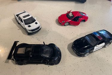 Lot of 4 Die cast cars Police Porsche Raptor Gallardo