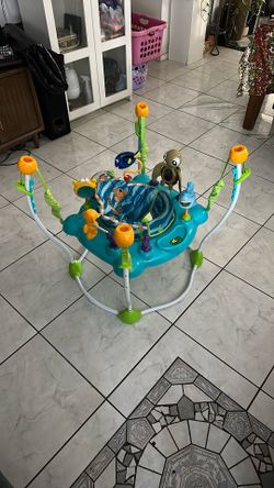 Bright Starts Disney Baby Finding Nemo Sea of Activities Baby Activity Center Jumper with Interactive Toys, Lights, Songs & Sounds, 6-12 Months (Blue)