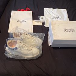 Pair of slightly use Alexander McQueen sneakers size 12