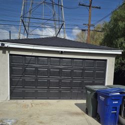 2 car garage door.  Dark Brown/ Black 