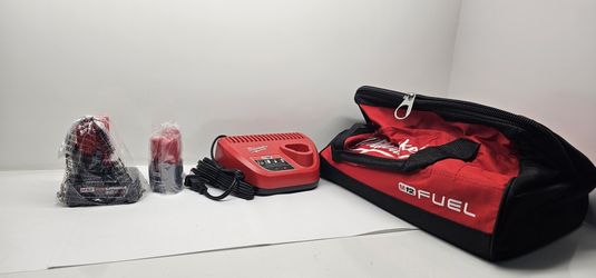 Milwaukee Batteries, Charger And Bag