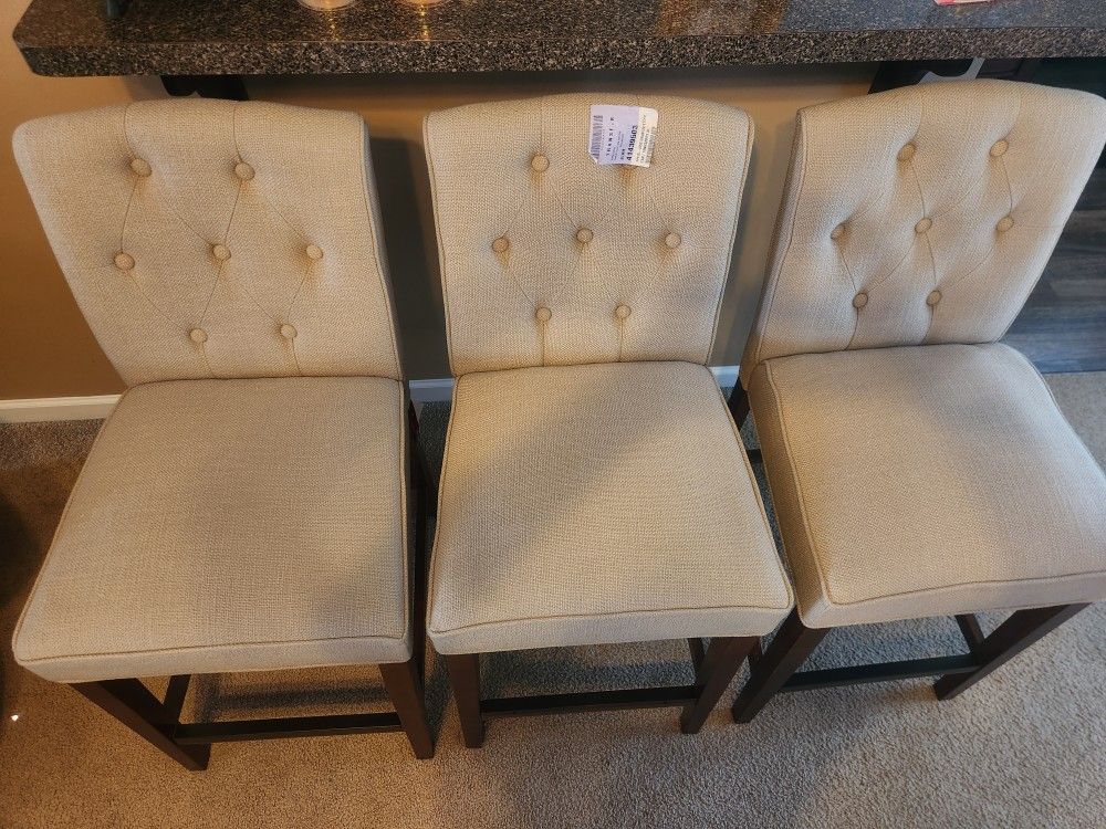 3 Tuffed Counter Height Stools