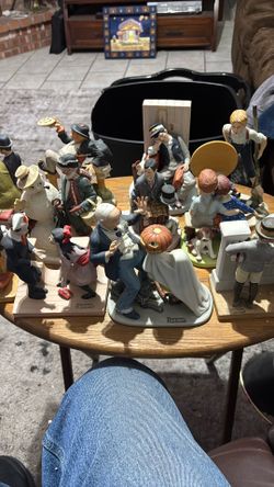The 12 Norman Rockwell porcelain figurines complete set