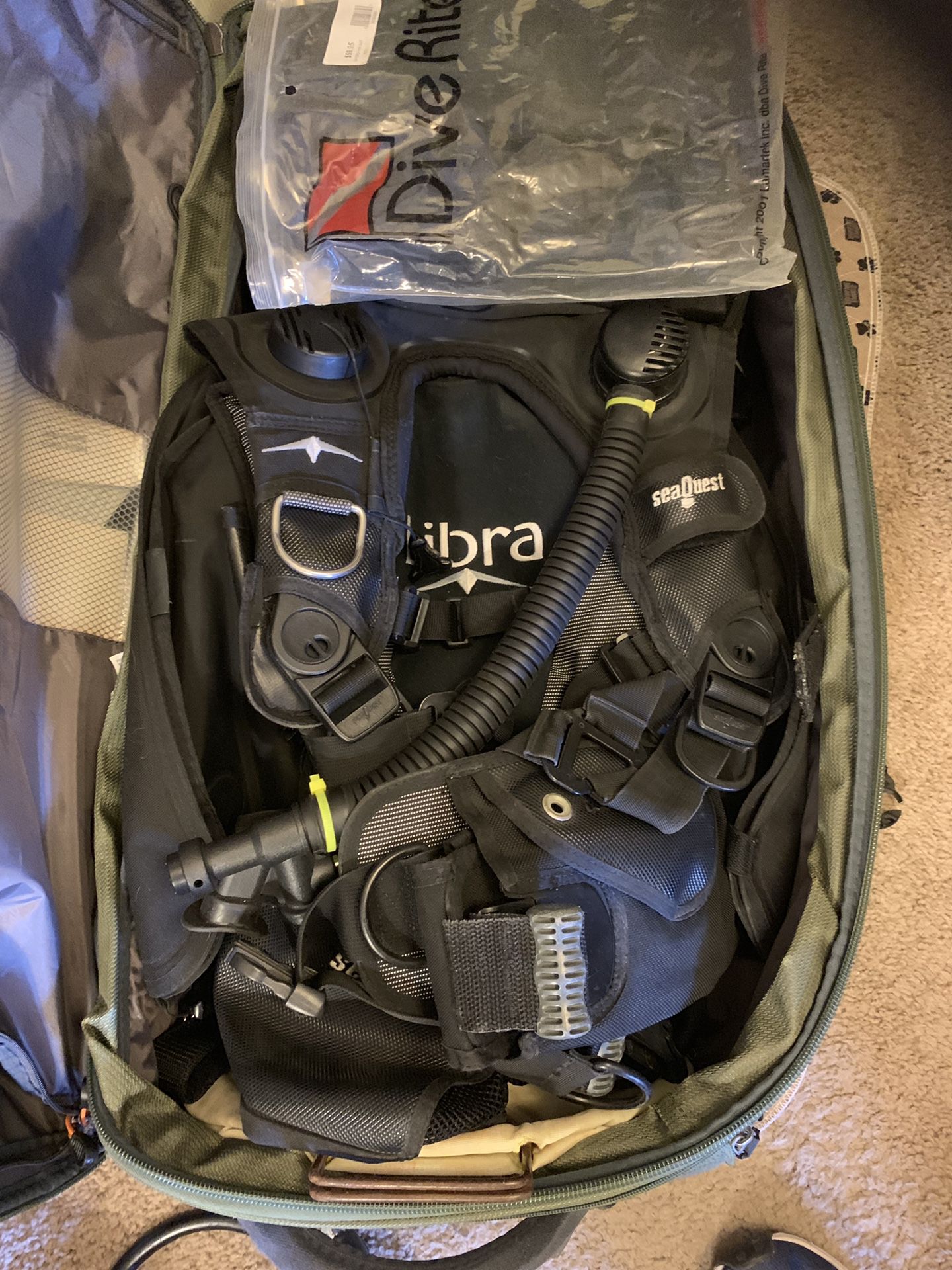 Small Scuba pack with BCD, accessories, dive computer, and full bag