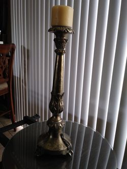 Single gold tone heavy candle holder