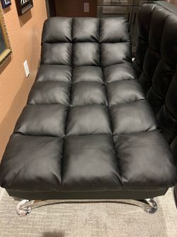 Black lounge chair.
