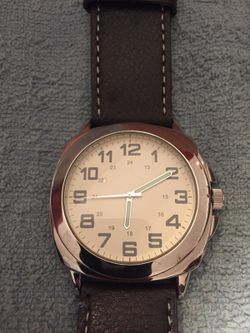Large Face round silver tone watch with brown leather band