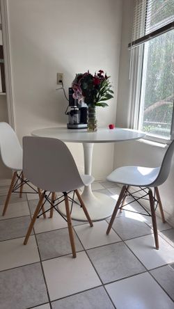Round dining table and chairs