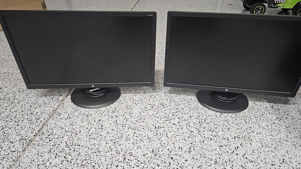 Dual 22" HP Computer  Monitors with HDMI cables/ stands